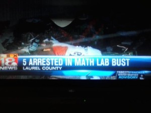 picture of a newscast on TV "5 arrested in meth lab bust"